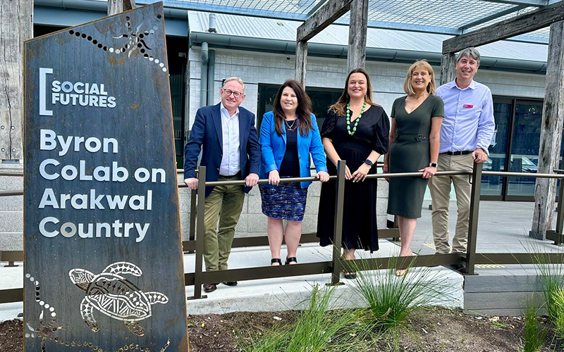 Five dignitaries standing in front of Byron CoLab on Arakwal Country