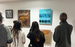Byron community members looking at NAIDOC gallery art at Byron CoLab
