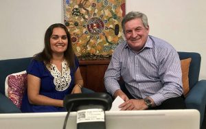First Nations woman and Caucasian man ready to present a webinar